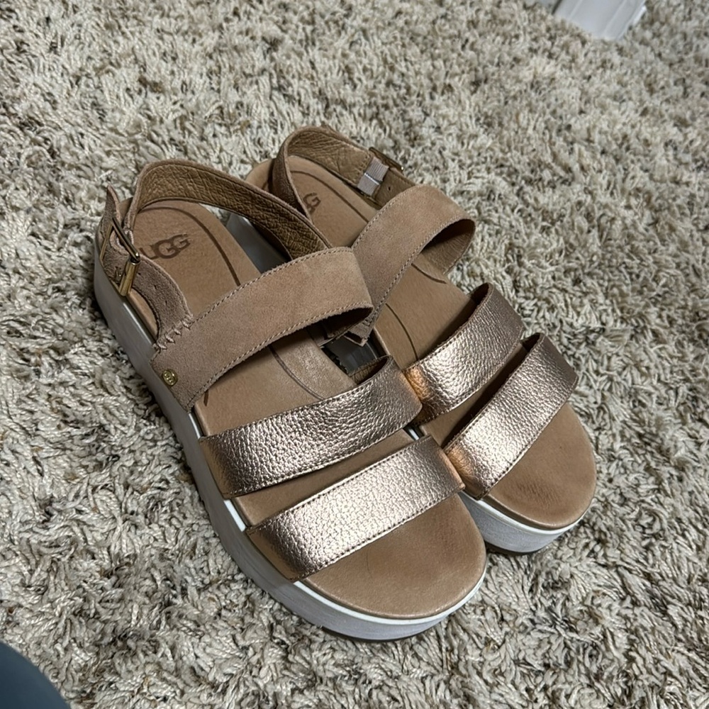 Rose gold Ugg platform wedges.